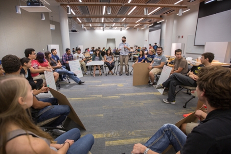 STEM students sitting in chairs in a circle formation
