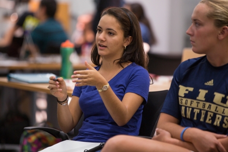 STEM Student speaking while making gestures with her hands