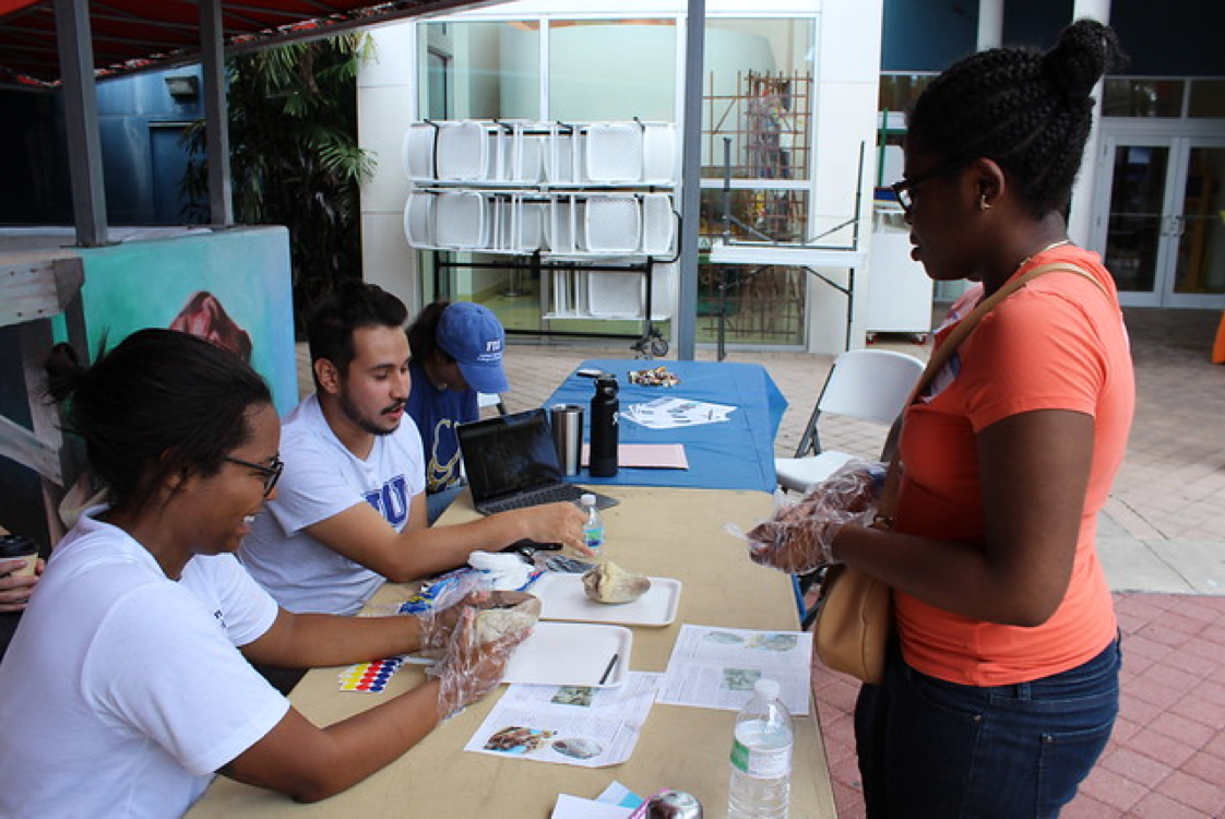 HWCOM students at a table