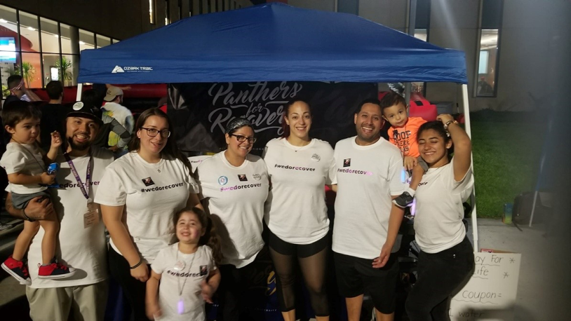 Panther for Recovery Group under a blue tent at the College of Business Complex at Modesto A. Maidique Campus