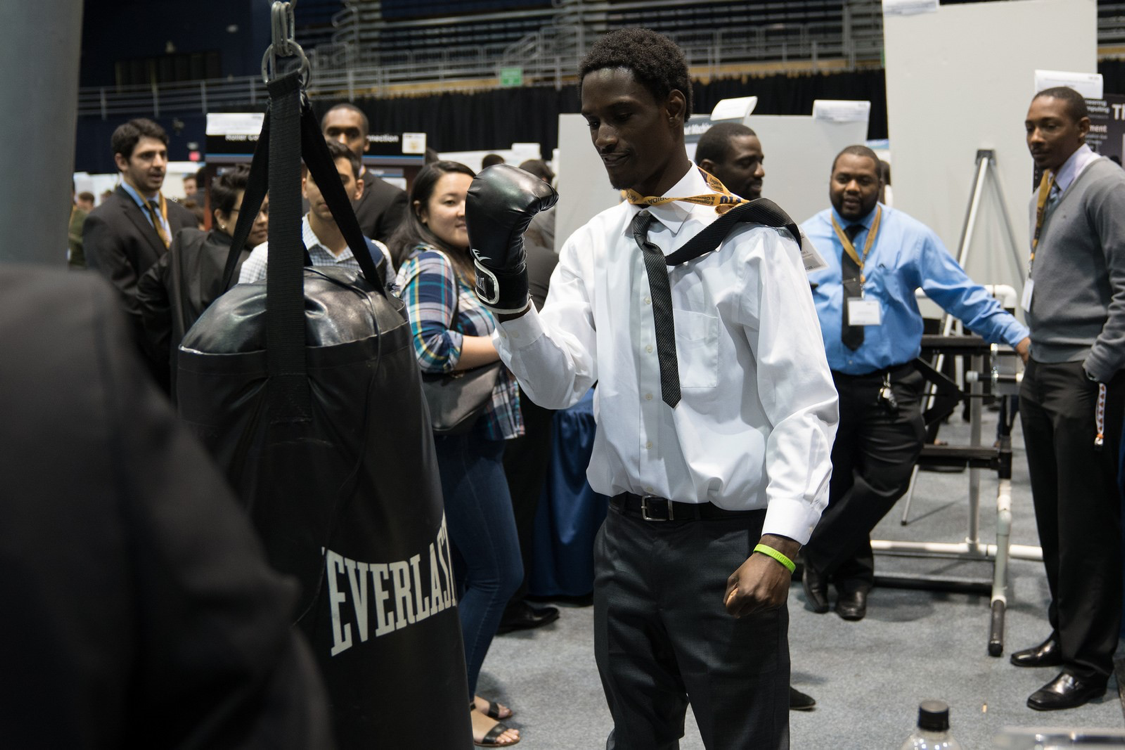 Mechanical and Material Engineering student boxing in FIU arena